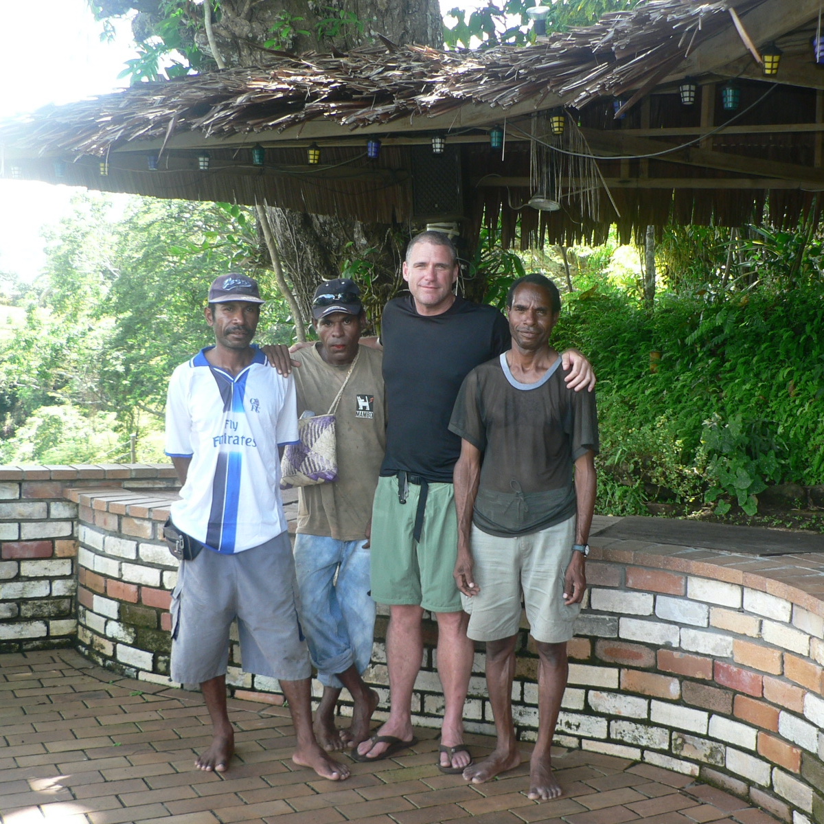 My dear brother Greg passed away on January 23, 2022.  Here he is in Tufi, Collingwood Bay, with a couple local guys and our good friend Raymond Kuaru from Bukitu village in West Yangoru—looks as if they are just back from a patrol down the coast—April 2007.