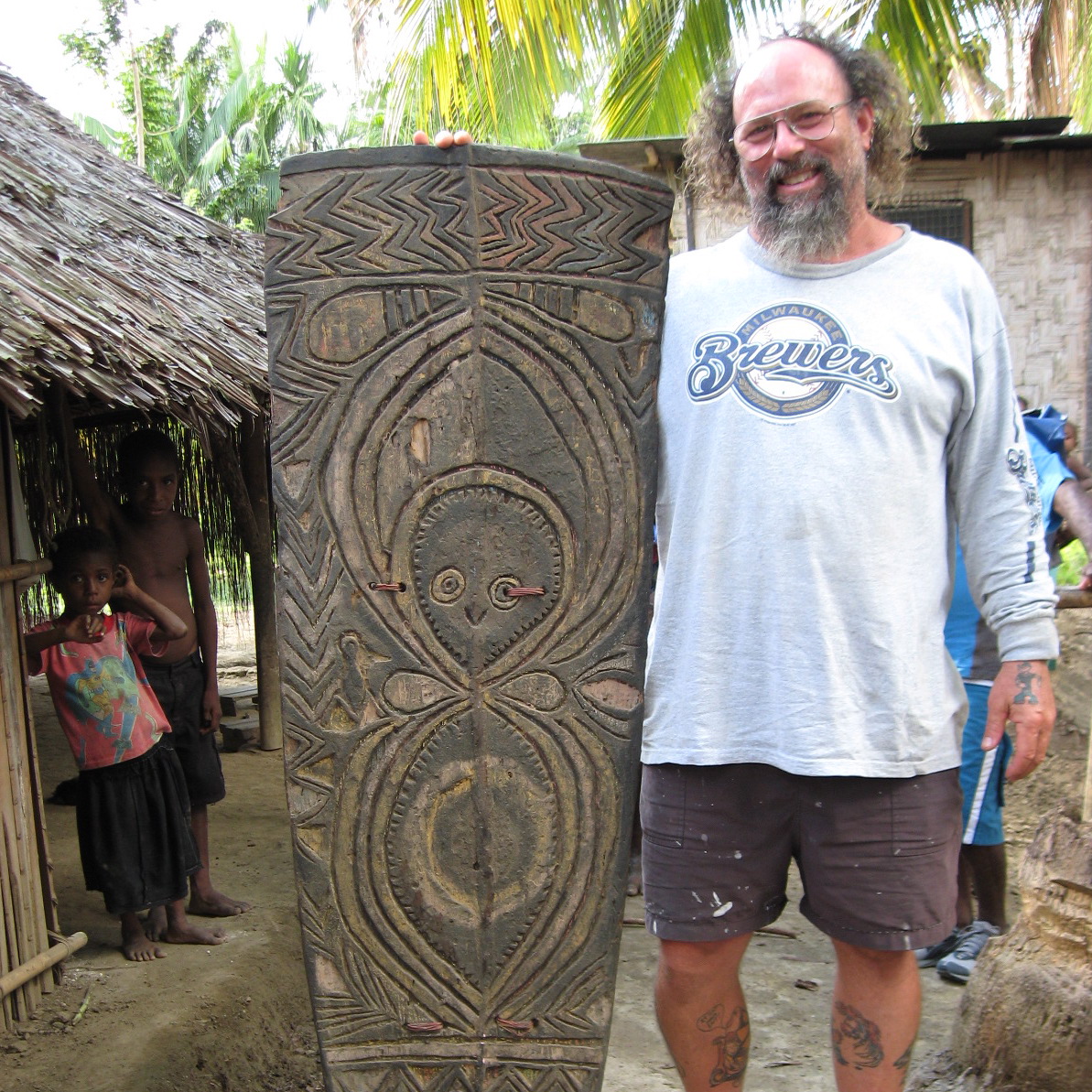 Jim Sanders with Bongos Arkosame Shield, New Guinea Art, Oceanic Art, South Pacific Art, Tribal Art