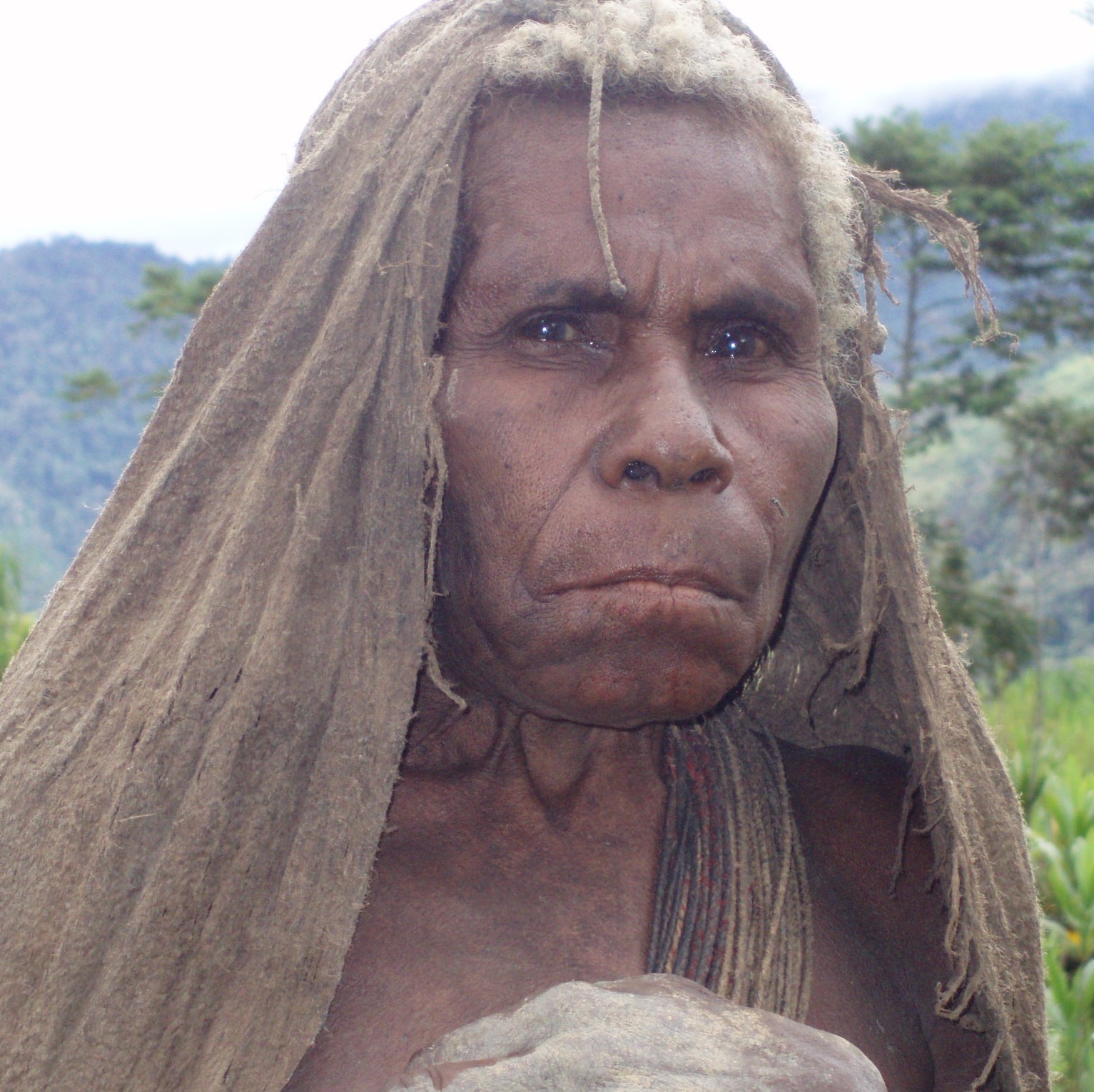 Menyamya woman with tapa rain cape, New Guinea Art, Oceanic Art, Tribal Art, South Pacific Art, Michael Hamson
